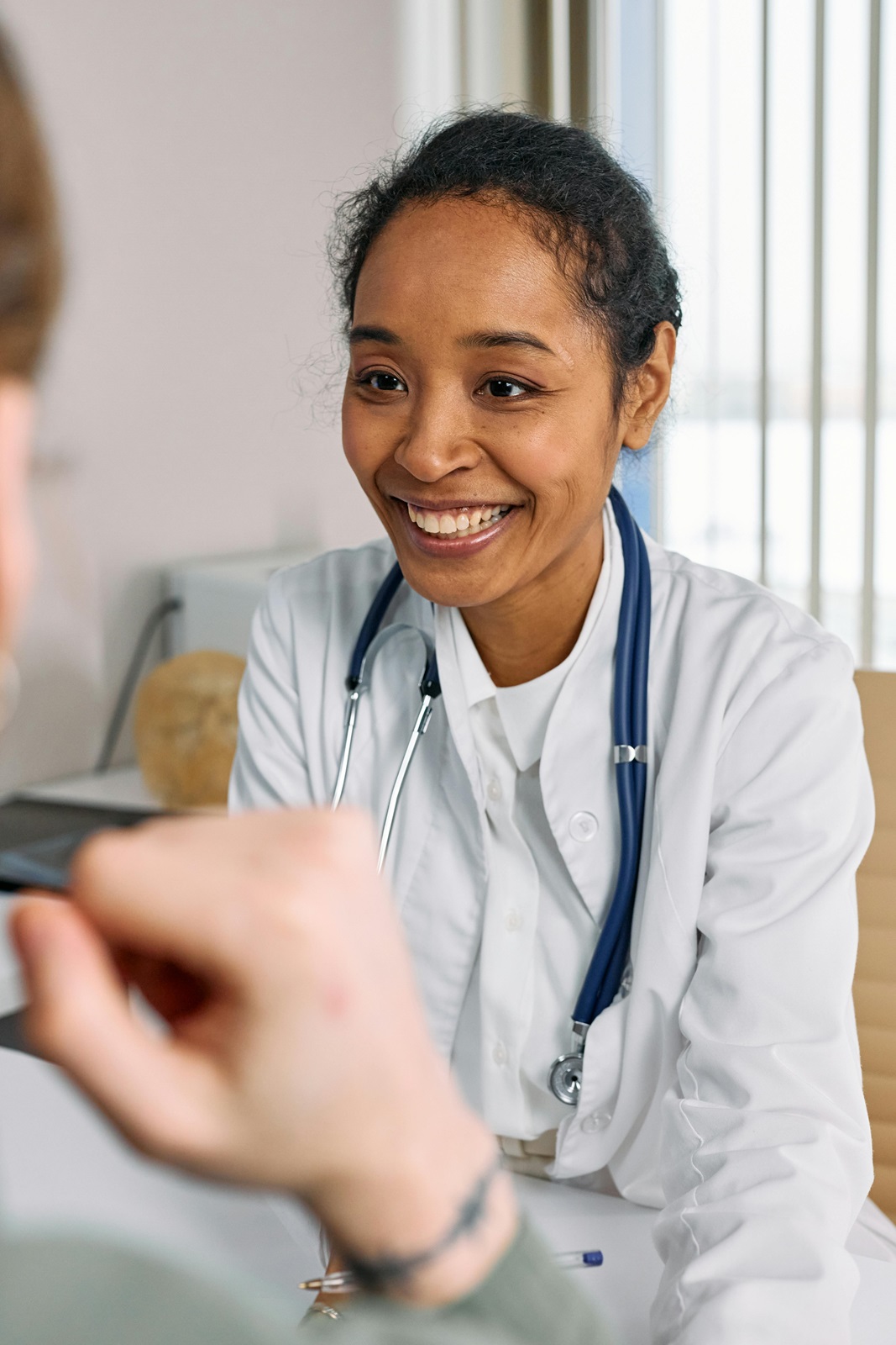 Female doctor with patient